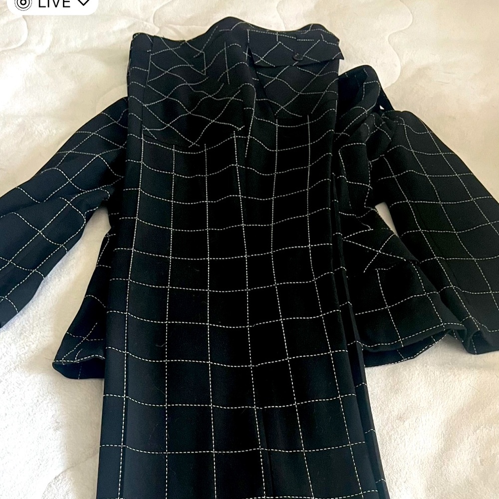 Trina Turk black pant suit.  Great boot cut trouser and fitted jacket.
